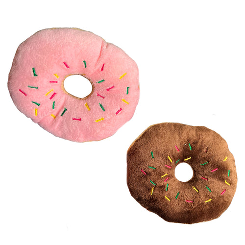 One pink and one brown donut plush chew toys for dogs